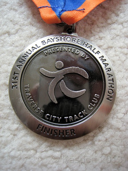 2013 Bayshore Medal 02.JPG - Finisher Medal for the 2013 Bayshore Half Marathon. Traverse City Michigan. May 25, 2013